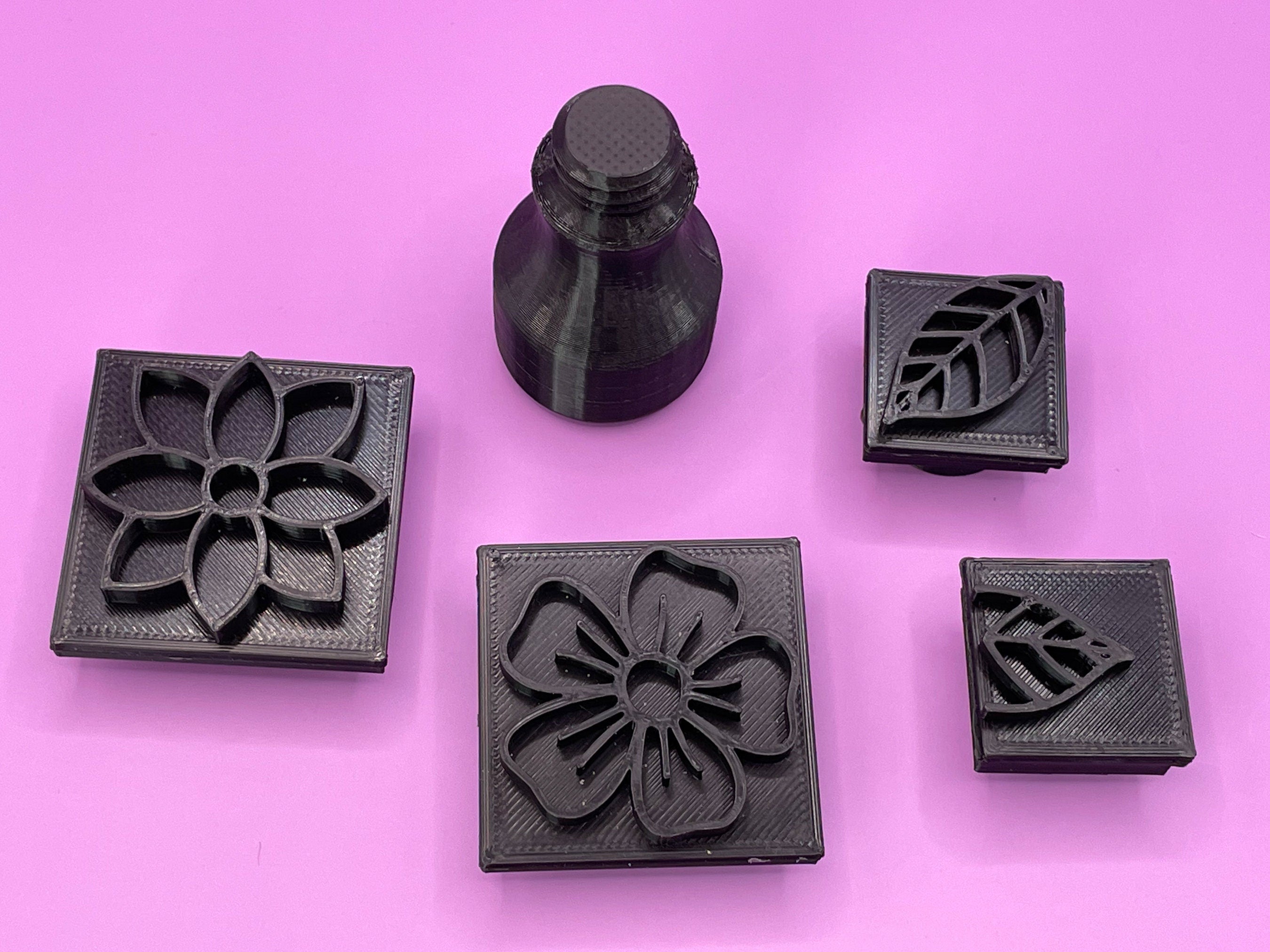 Set of 2 flower stamps, a full leave stamp and a half leaf stamp interchangeable - A Mayes Pottery
