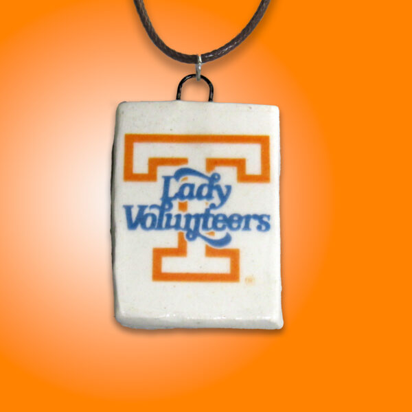 Lady-Vols-Rectangle-Pendant-on-bright-orange-V2jpg